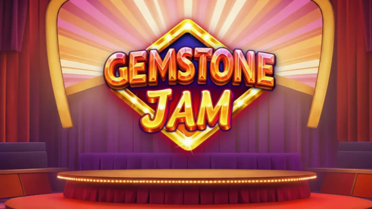 Tampilan visual slot Gemstone Jam dengan simbol permata dan suasana panggung acara TV